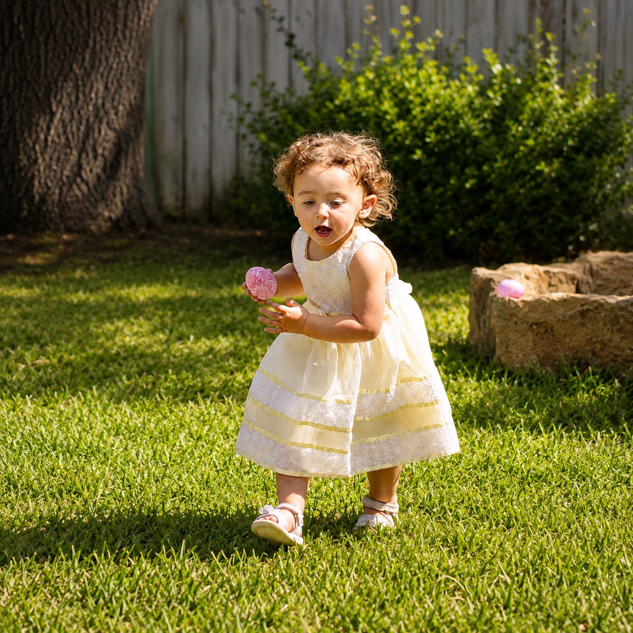 Child running in a yellow dress