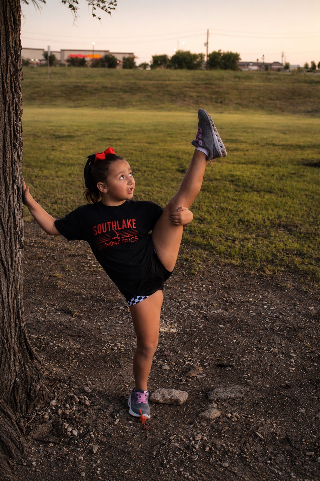 Young athlete stretching outdoors